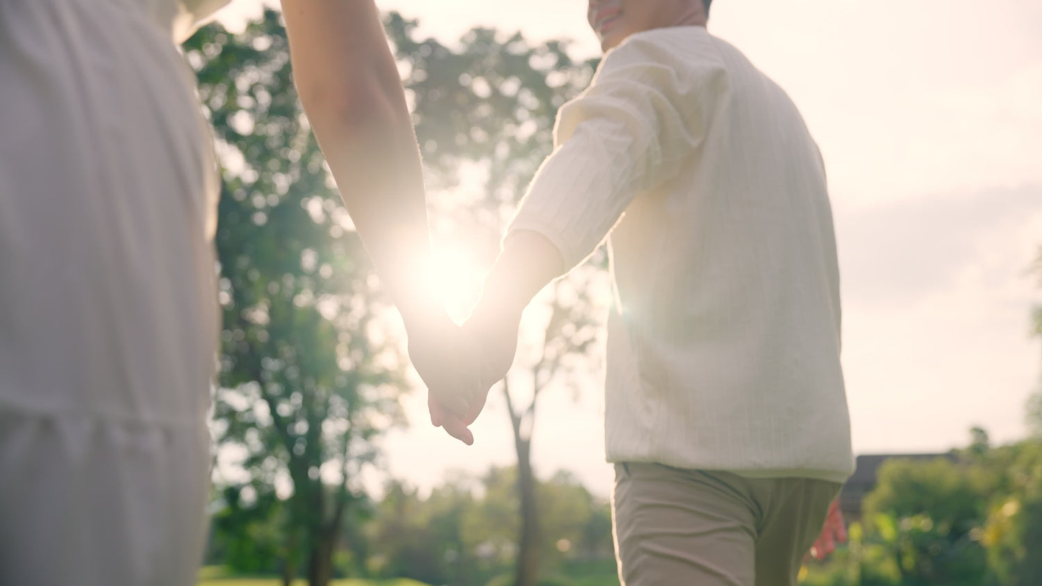 Couple holding hands